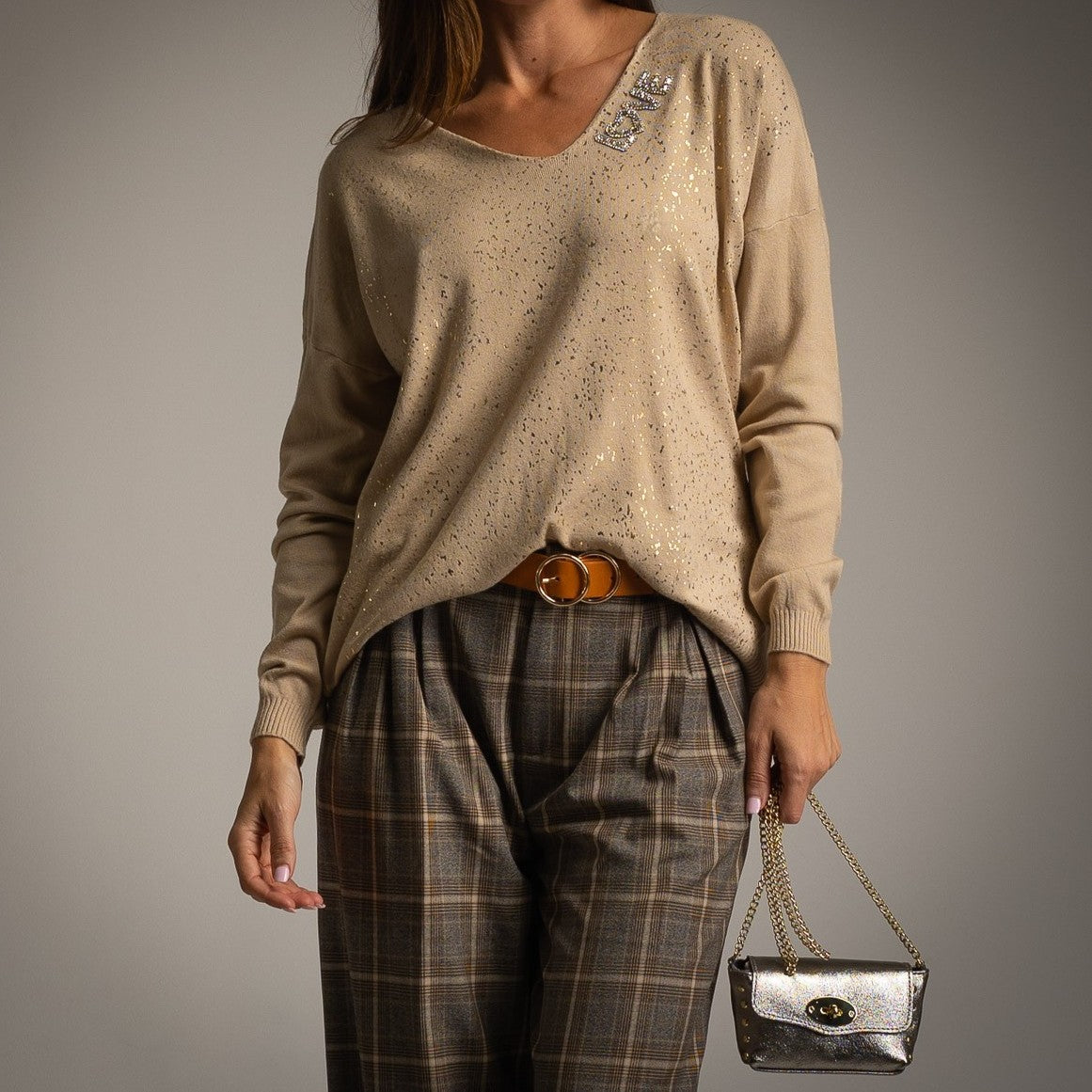 Latte Beige oversized V-neck knit sweater with golden glitter foil and embellished LOVE detail - front view