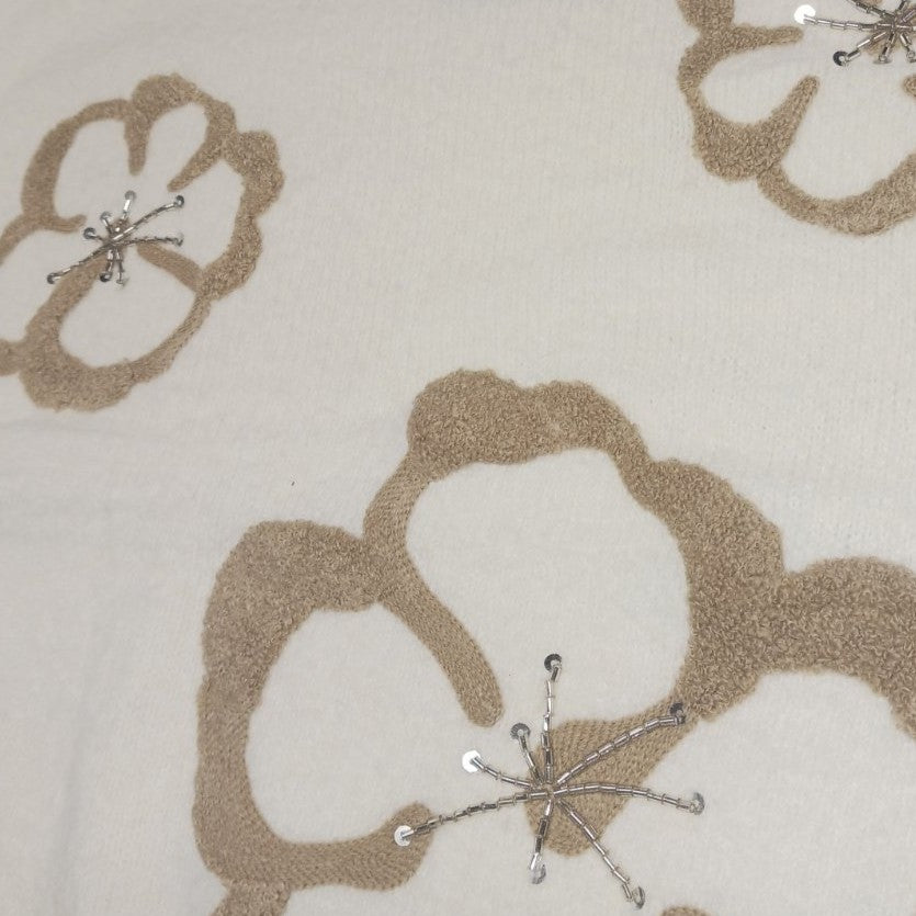 Ivory White ivory knit sweater with tonal bouclé flower appliqués and sequin details - detail view