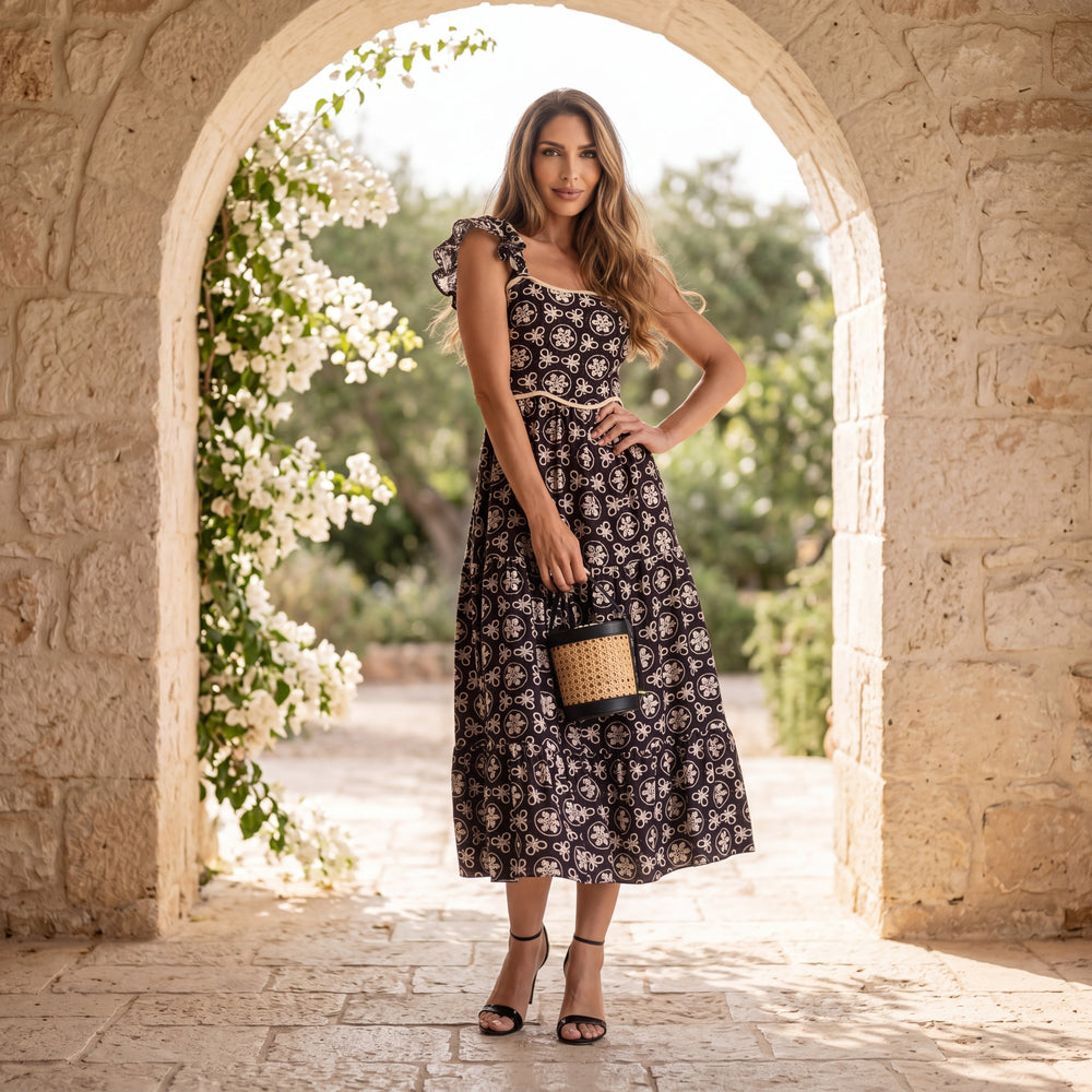 MARIΓIOÚ black midi dress with ivory floral print outdoor mediterranean style