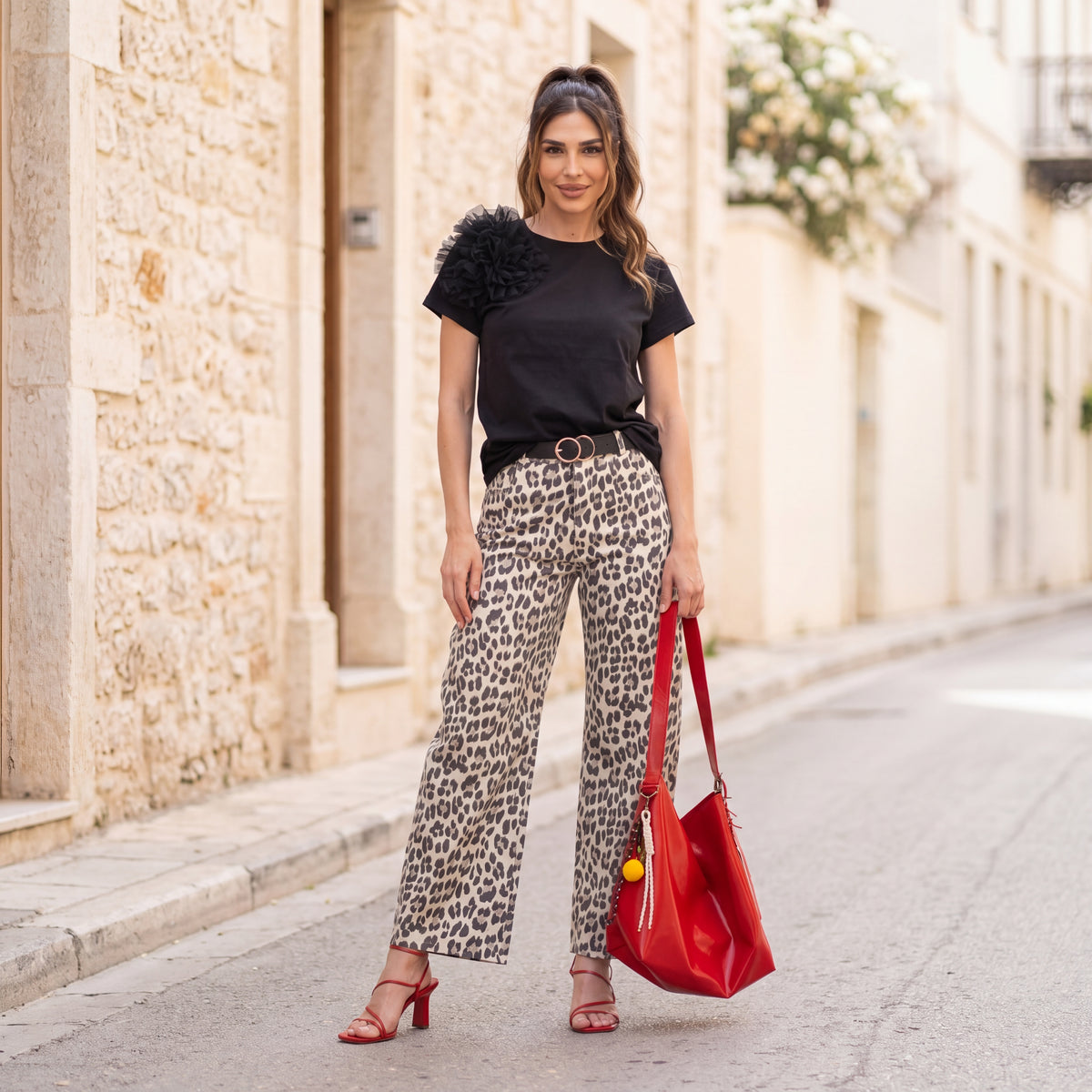 Black statement t-shirt with animal print pants outfit MARIΓIOÚ