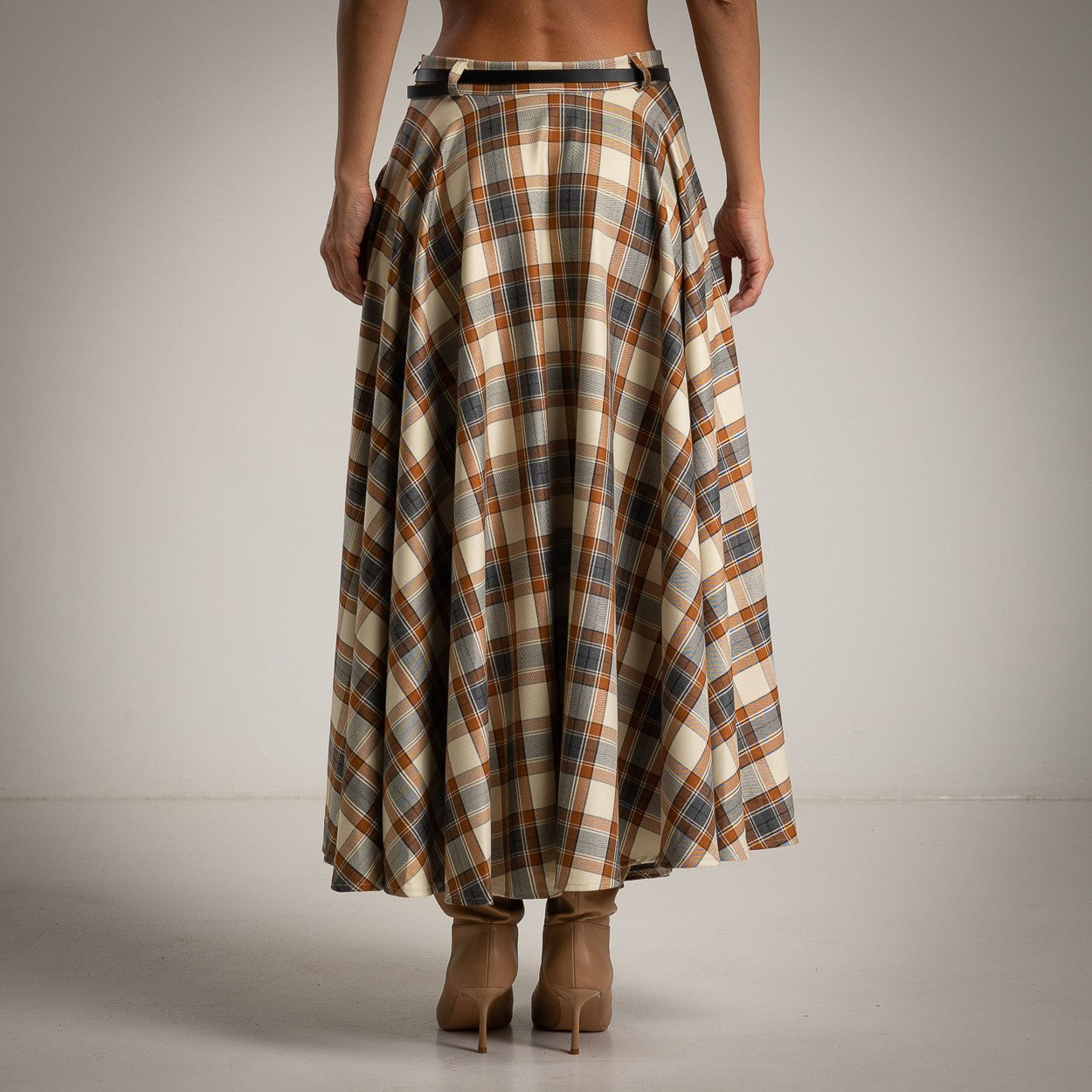 Back view of checked midi skirt in warm tones by MARIΓIOÚ