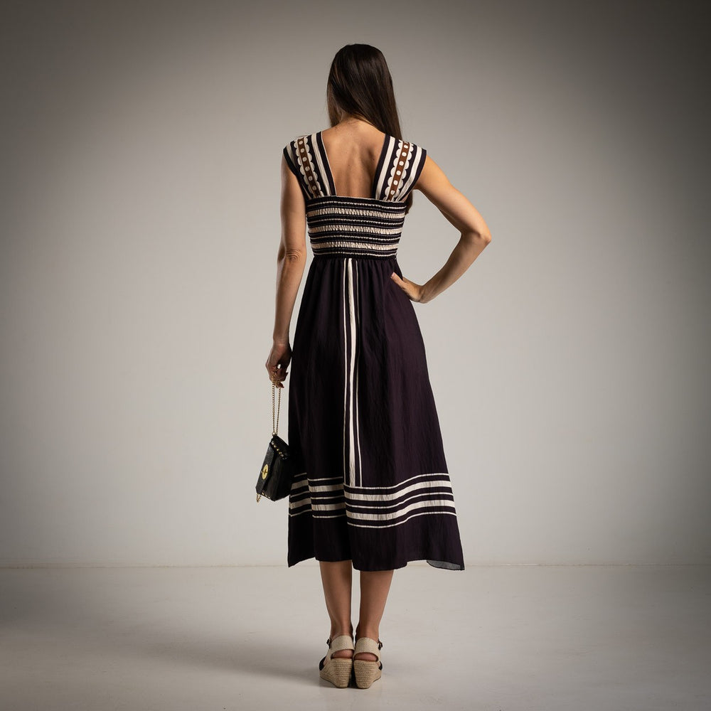 marigiou classic black cut out midi dress back view elegant silhouette