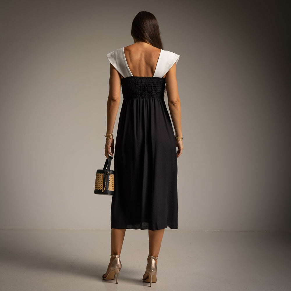 Back view of Classic Black resort midi dress with smocked back detail