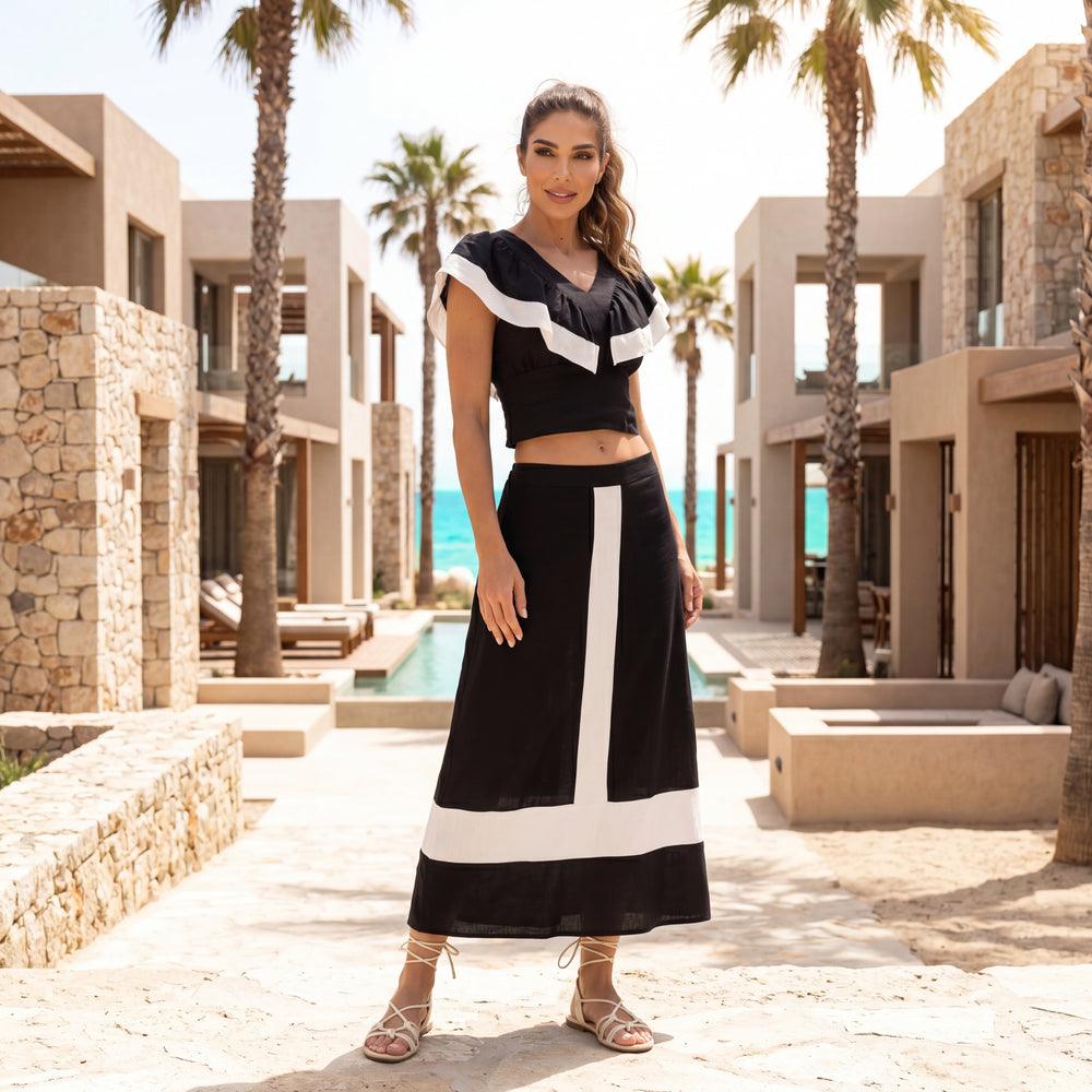 MARIΓIOÚ classic black resort wear set styled at luxury Mediterranean resort