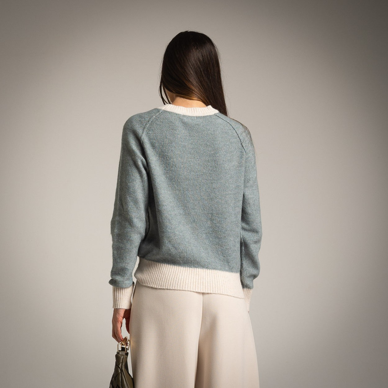 Contrast knit sweater by MARIΓIOÚ in blue and cream, back view