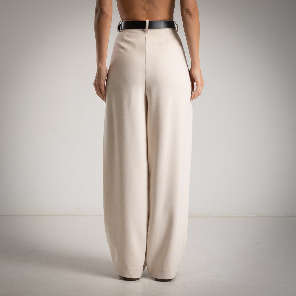 MARIΓIOÚ Creme balloon pants back view with rounded leg silhouette
