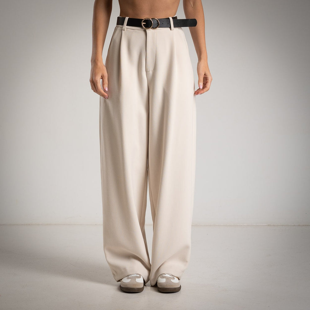 MARIΓIOÚ Creme balloon pants front view with high-waist tailored design