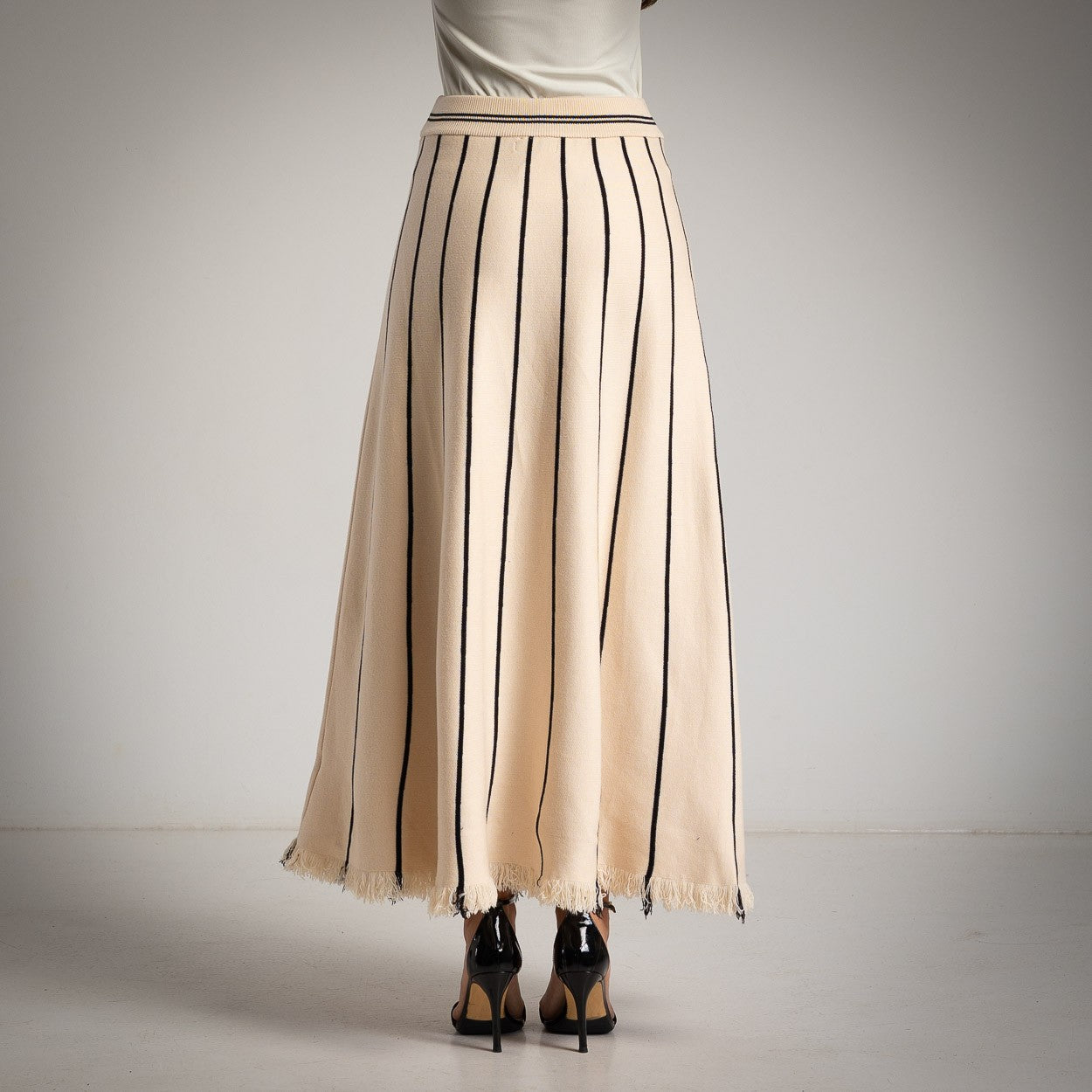 MARIΓIOÚ creme striped knit maxi skirt – back studio view