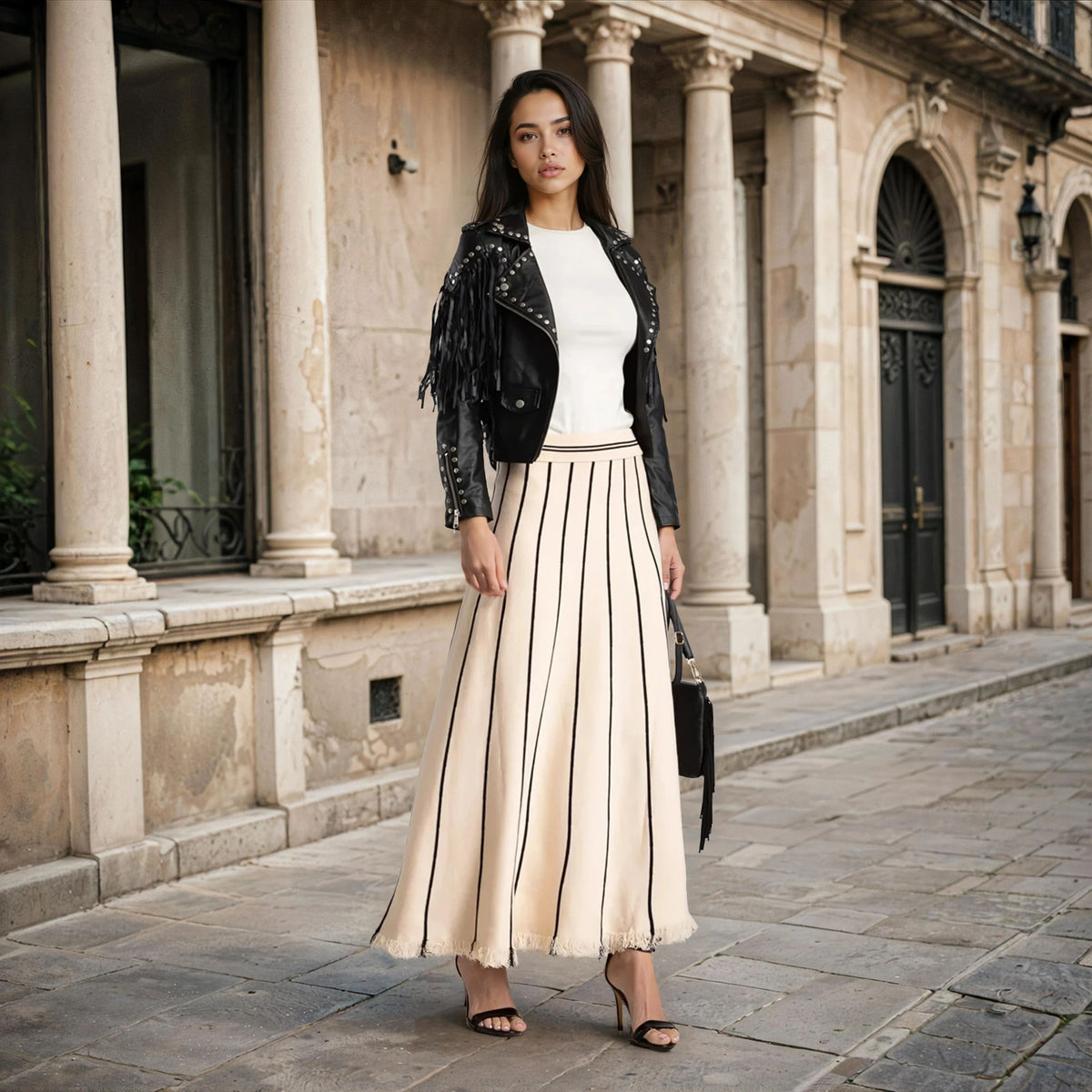 Creme striped knit maxi skirt styled with leather jacket – outdoor full look