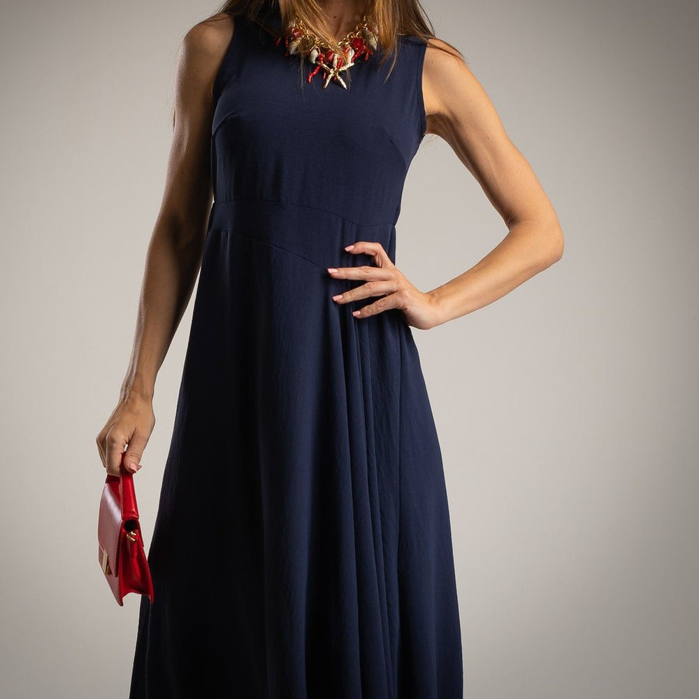 Deep Ocean Blue sleeveless midi dress with asymmetrical waist seam and elegant flowing silhouette