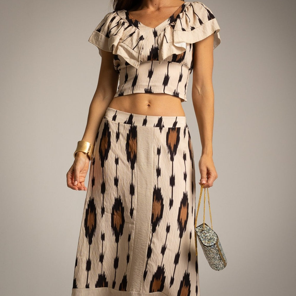 MARIΓIOÚ desert sand ikat print resort set with ruffle top and flowing maxi skirt front view