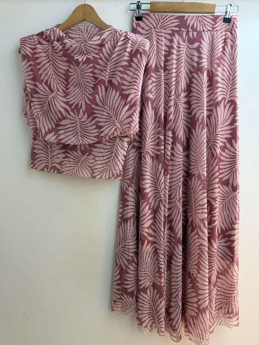 Dusty rosewood palm print one size set with sleeveless top and flowing maxi skirt hanging view