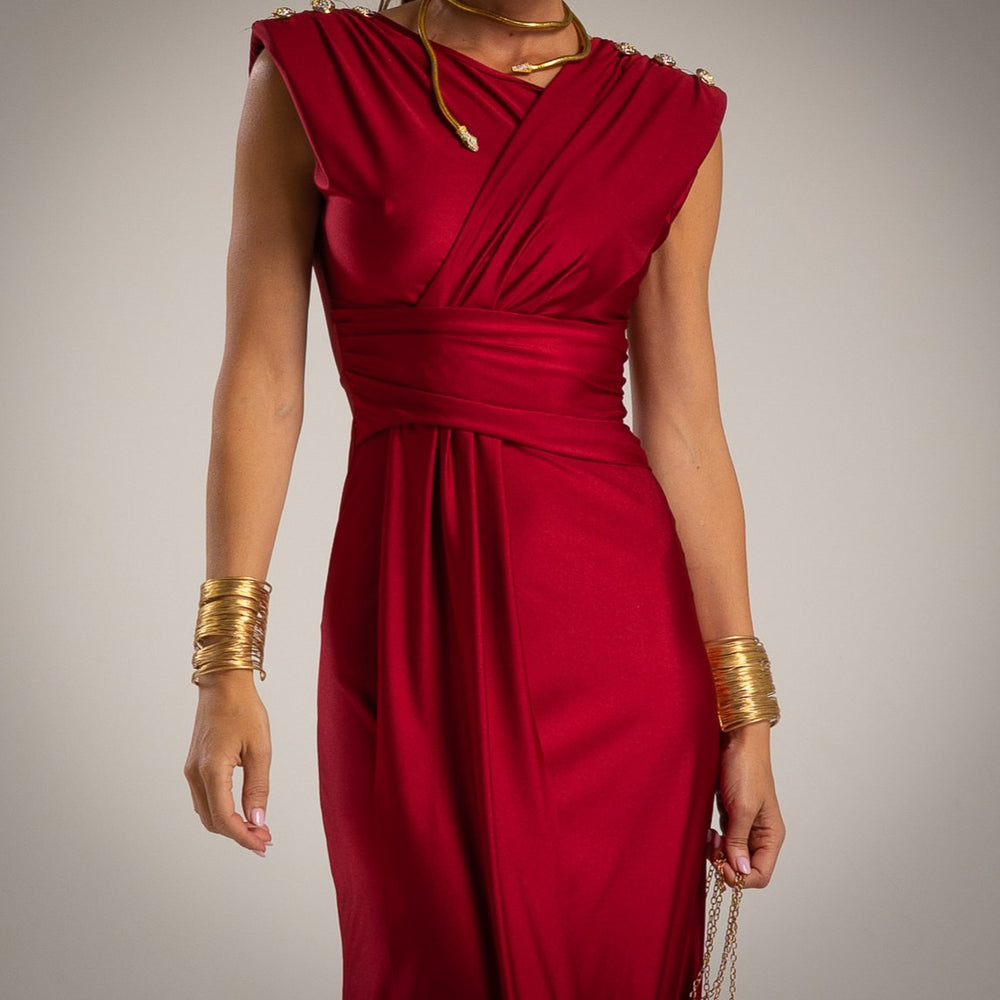 Elegant red draped midi dress with decorative shoulder buttons