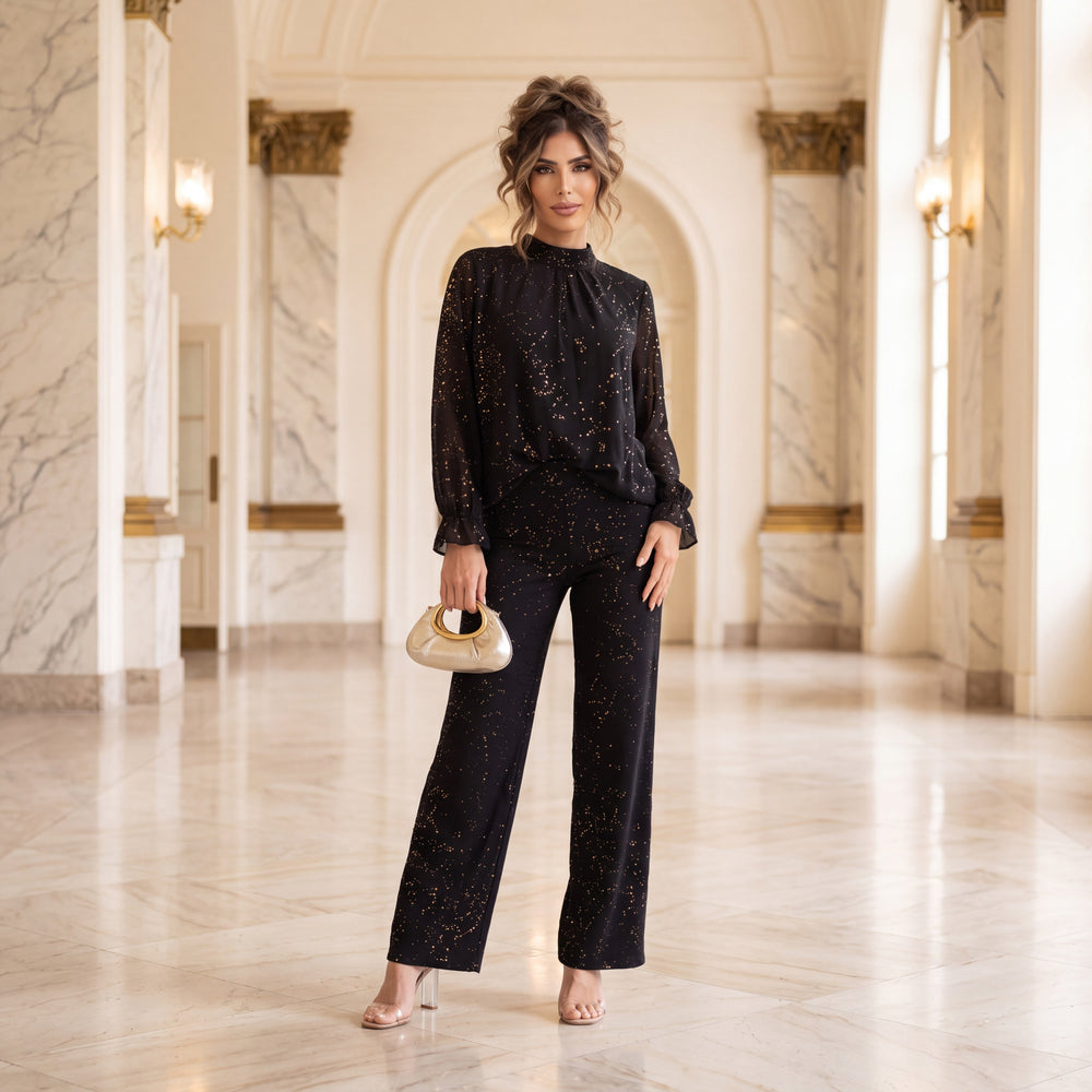 Black high-rise flared pants with scattered golden glitter foil by MARIΓIOU