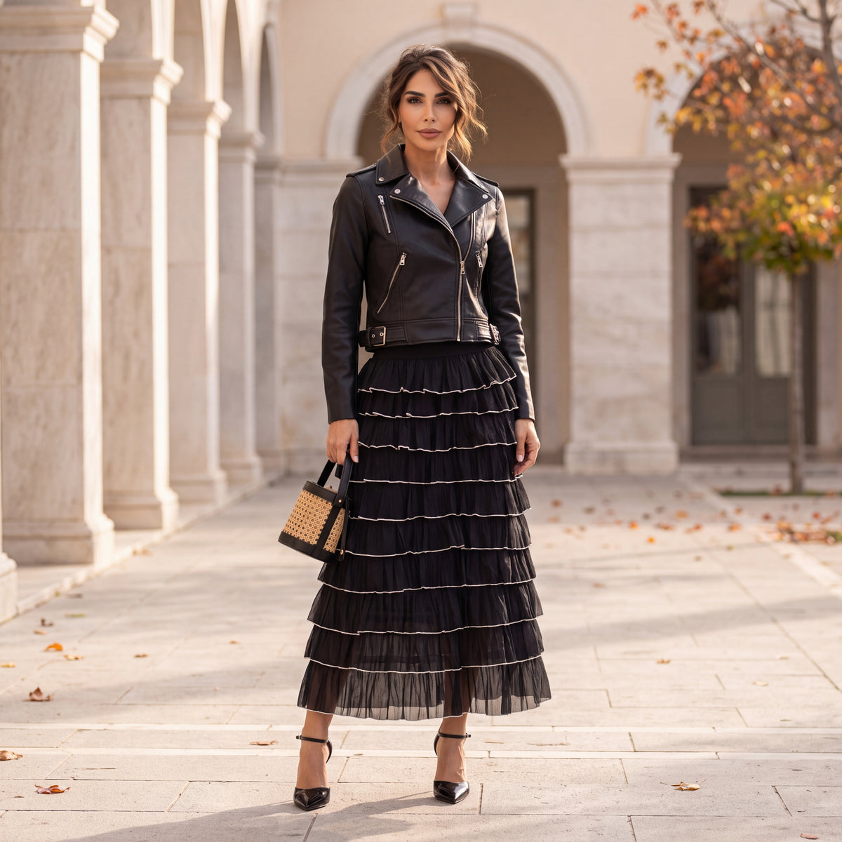 Black tiered tulle midi skirt with contrast-edged ruffles by MARIΓIOU