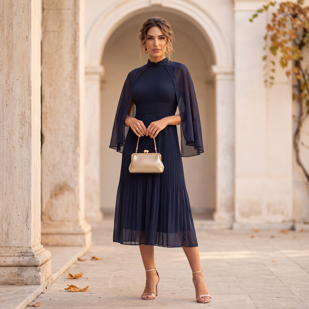 Midnight Blue pleated midi dress with chiffon cape and high neckline by MARIΓIOU