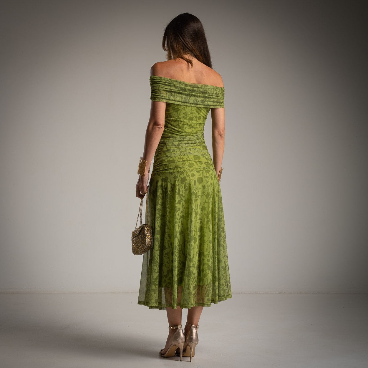 Back view of MARIΓIOÚ lime green floral off shoulder midi dress