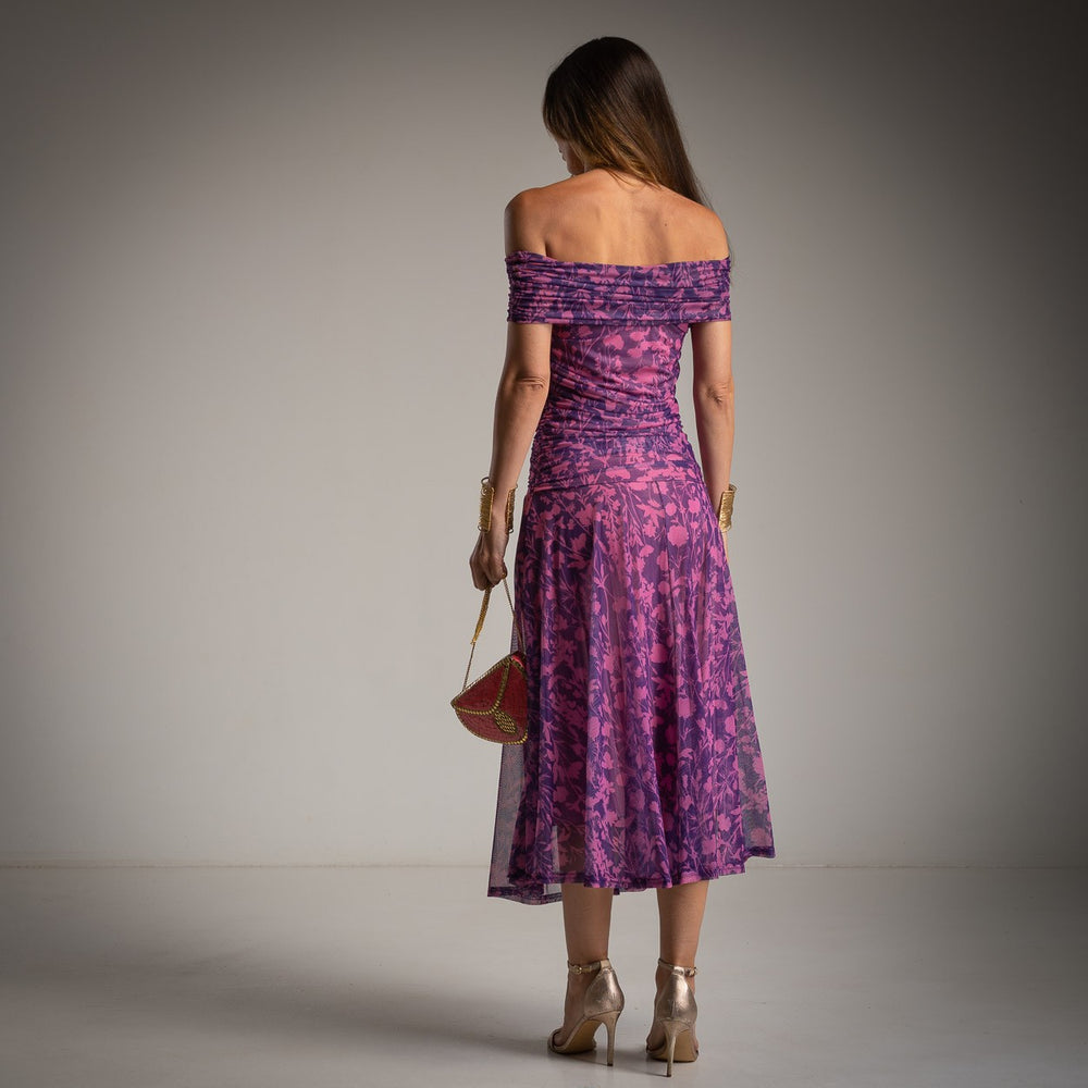 Back view of MARIΓIOÚ purple floral off shoulder midi dress
