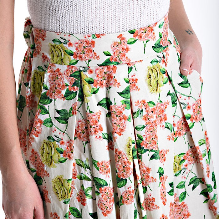 Floral pleated midi skirt with structured high waist and front pleats