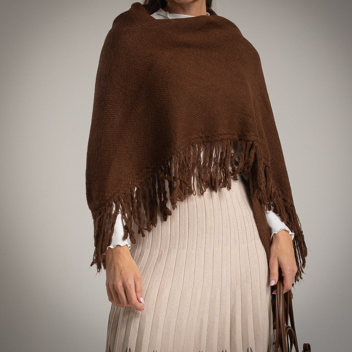 Chocolate knit shawl with fringe detail – front view