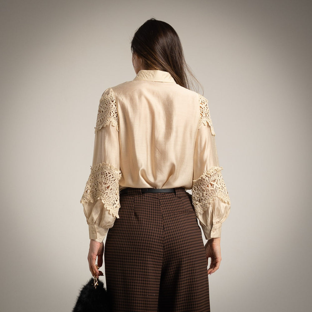 Back view of guipure lace blouse with long sleeves