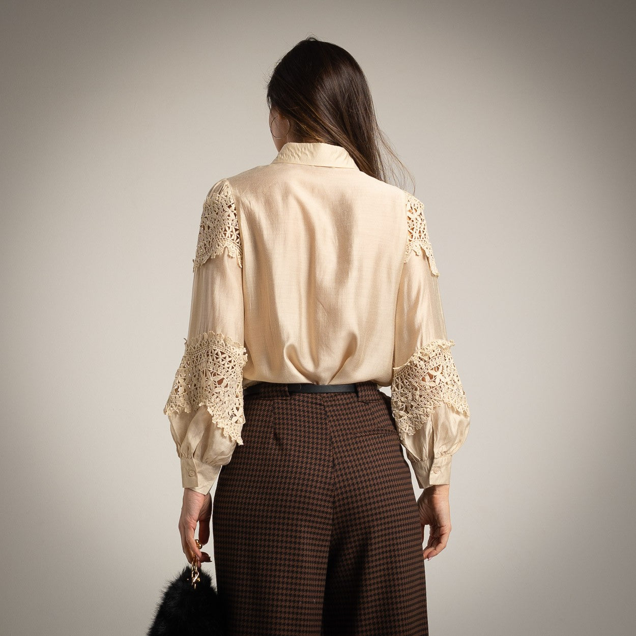 Back view of guipure lace blouse with long sleeves