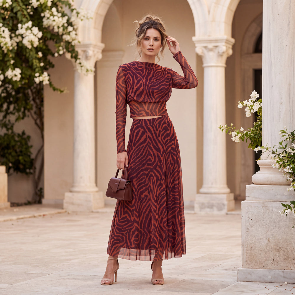 Plum animal print tulle two-piece set with cropped long-sleeve top and flowing skirt by MARIΓIOU