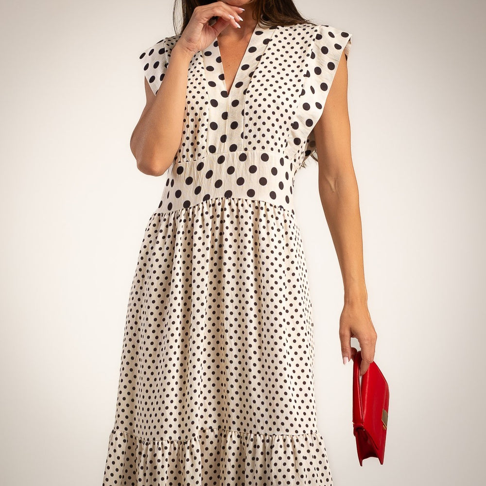Ivory white polka dots midi dress featuring V-neckline cap sleeves and flowing midi silhouette