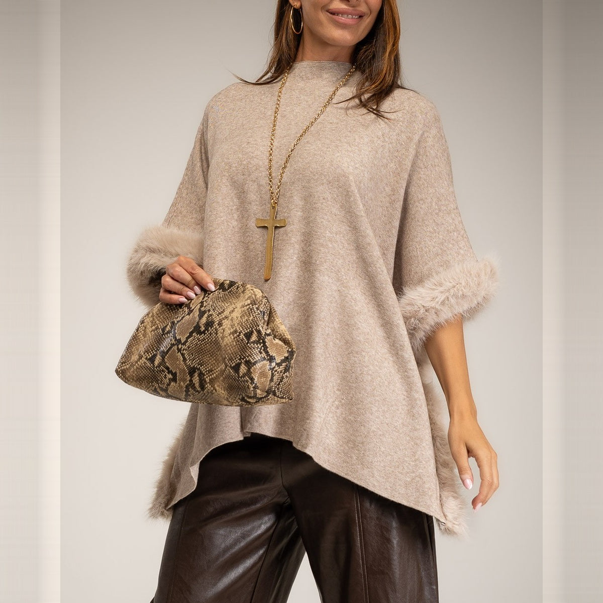 Almond Taupe knit poncho with faux fur trim and mock neck - front view