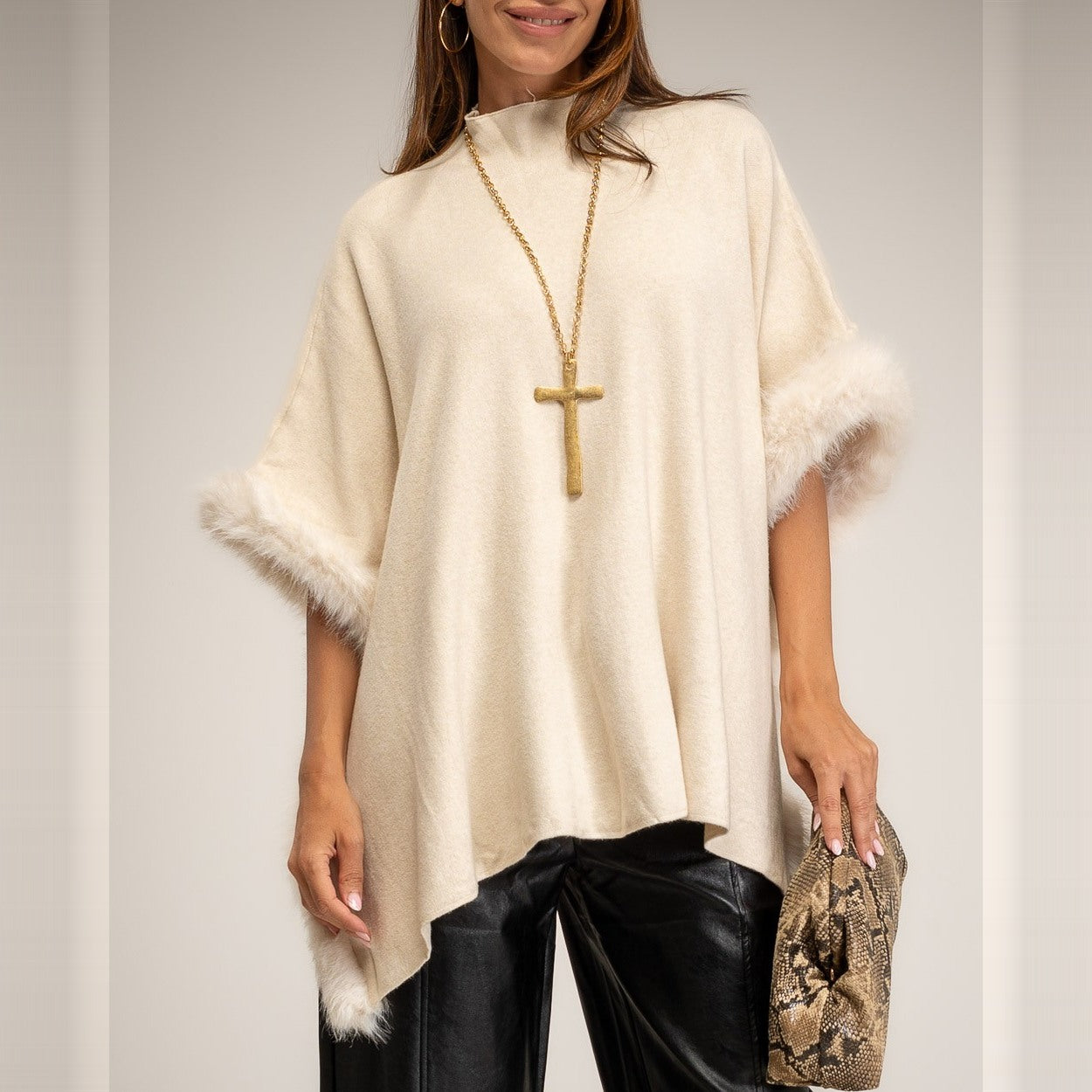 Latte Beige knit poncho with faux fur trim and mock neck - front view