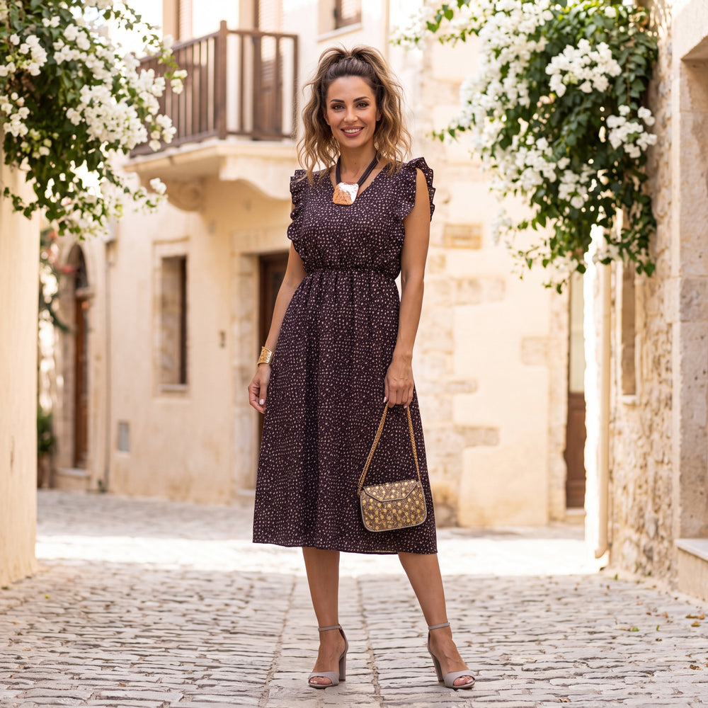 Woman wearing the Livia ruffle midi dress in Classic Black