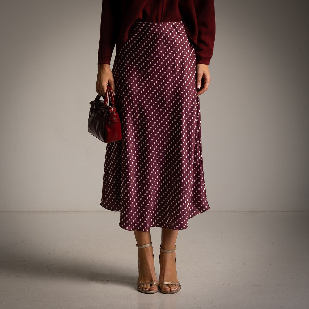 Deep Wine Red polka dot satin midi skirt with a softly flared cut - front view