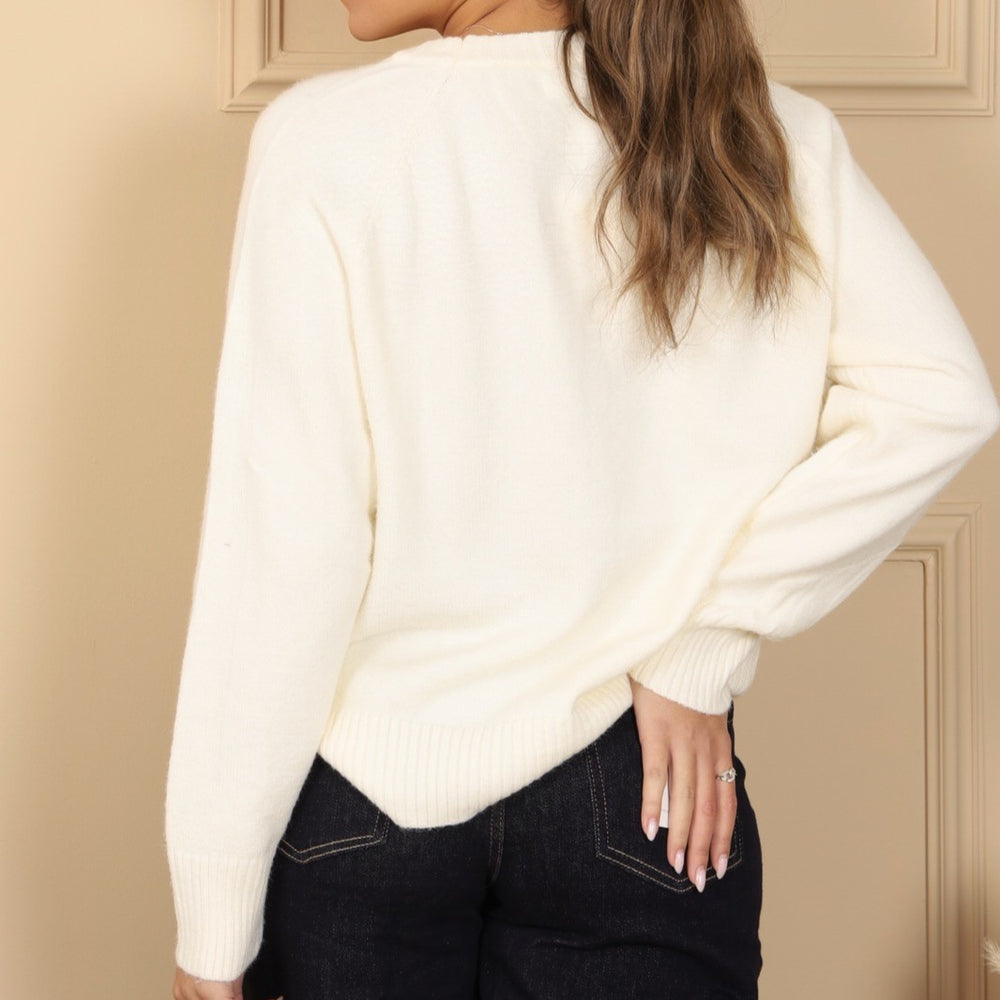 Ivory White knit sweater with embroidered tennis bear and Los Angeles varsity lettering - back view