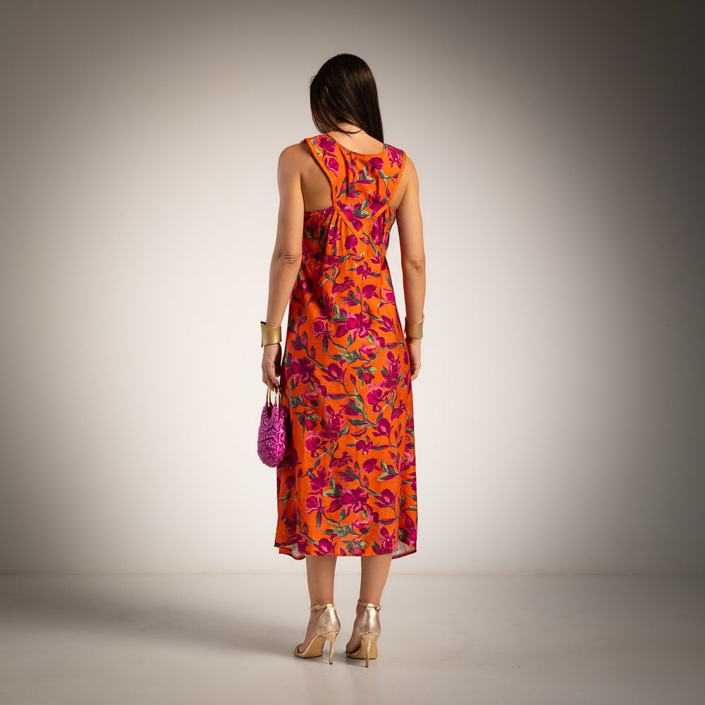 Back view of the Made in Italy floral halter midi dress in Sunset Papaya