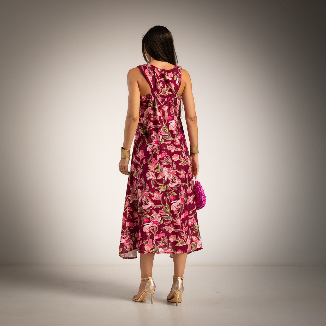 Back view of the Made in Italy floral halter midi dress in Wild Berry Bloom