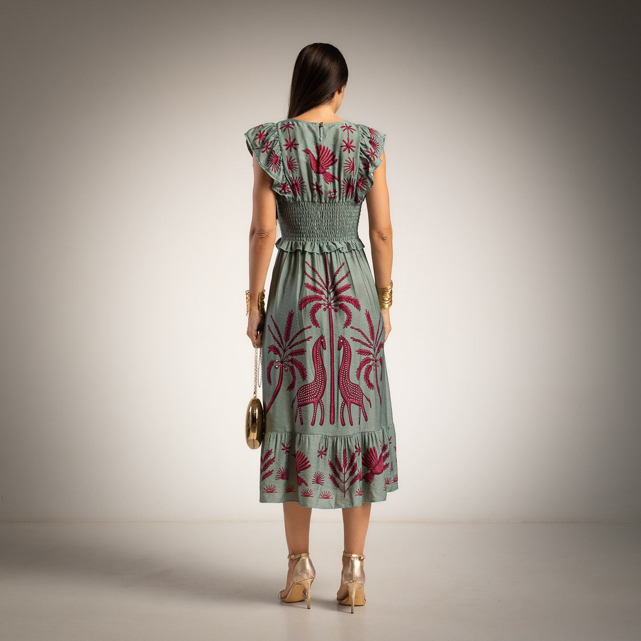 Back view of the Made in Italy printed midi dress in Dusty Mint