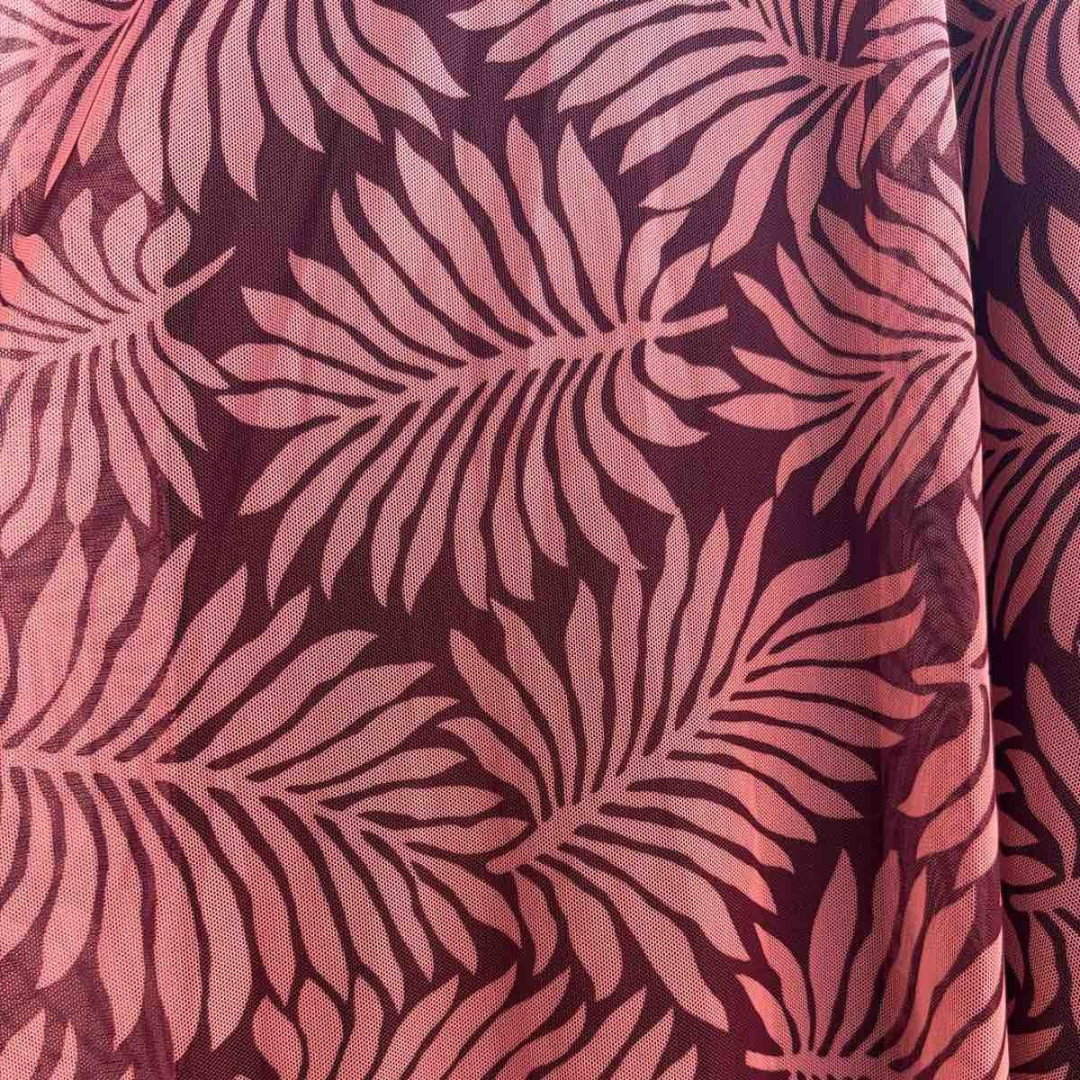 Coral Blush palm print tulle two-piece set with cropped long-sleeve top and flowing skirt - detail view