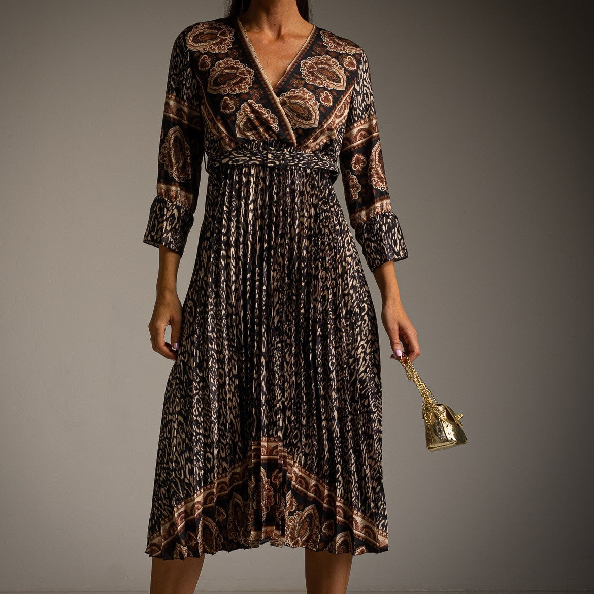 Black paisley print pleated midi dress with wrap neckline and balloon sleeves - front view