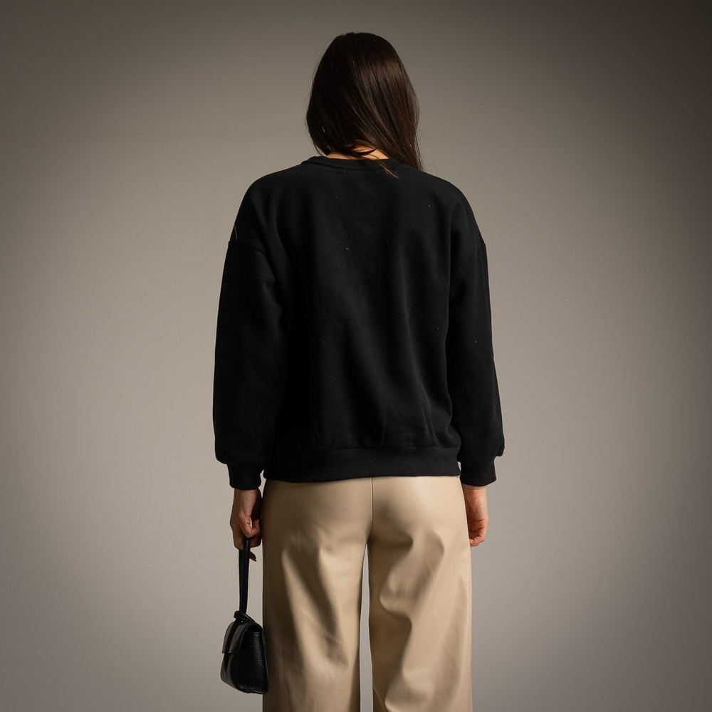 Black sweatshirt with three-dimensional jewel flower appliqués and ribbons - back view
