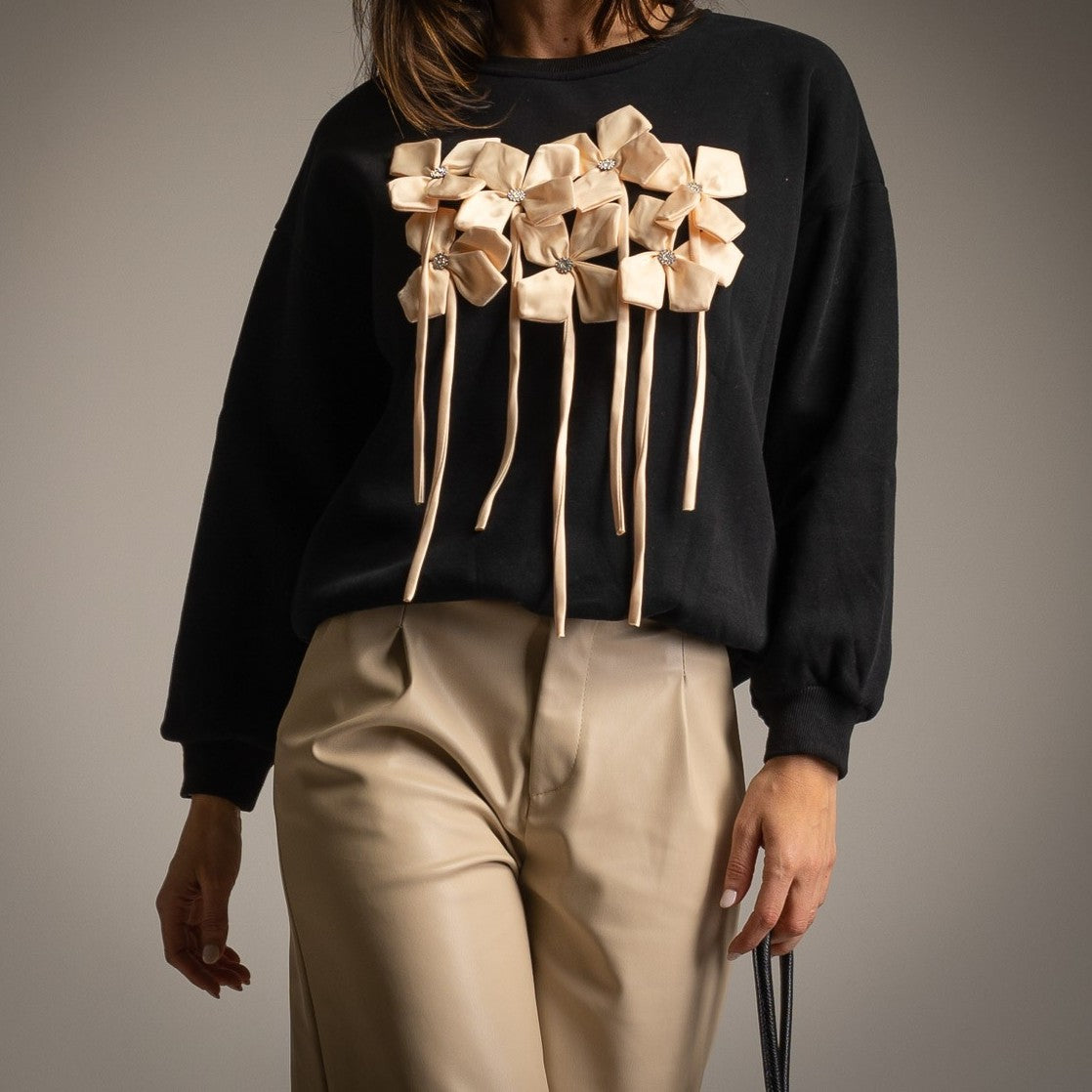 Black sweatshirt with three-dimensional jewel flower appliqués and ribbons - front view