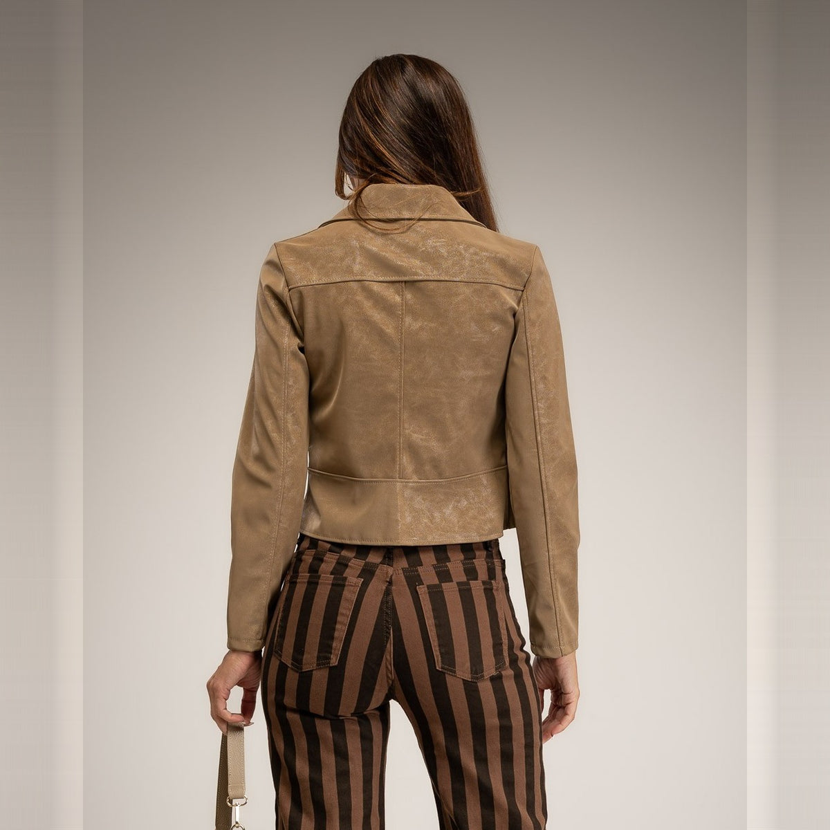 Almond Taupe cropped vintage faux leather jacket with shirt collar and belt loops - back view