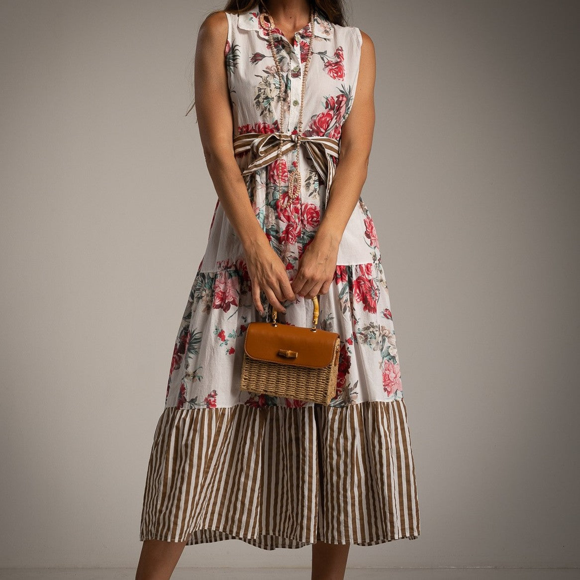 Close-up of MARIΓIOÚ floral summer shirt dress in Chocolate with elegant striped details