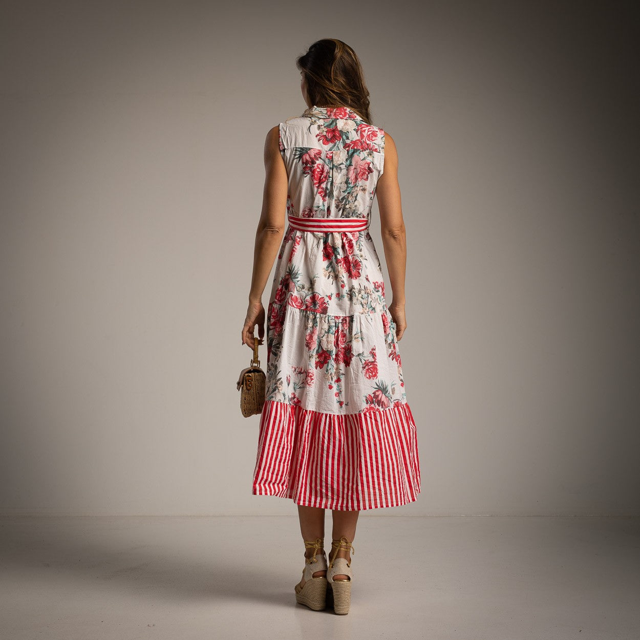 Back view of MARIΓIOÚ floral shirt dress in Poppy Red with striped hem detail