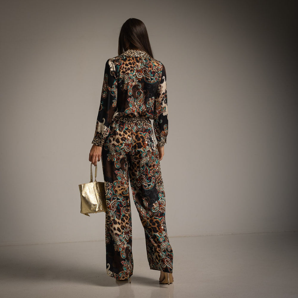 Black paisley and leopard print two-piece set with button-down blouse and wide-leg pants - back view
