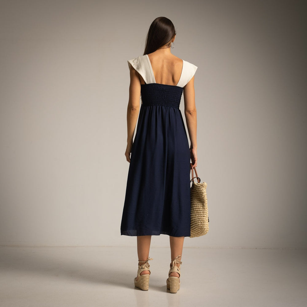 Back view of Midnight Blue midi resort dress with smocked waist detail