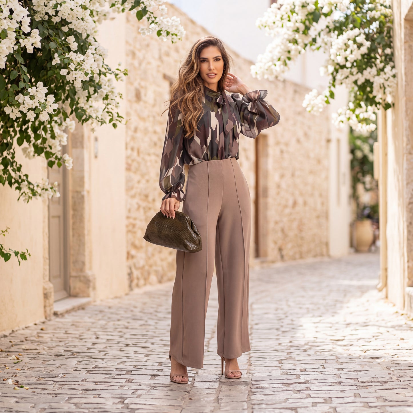 Almond Taupe high-waisted flared trousers with a pressed centre seam by MARIΓIOU