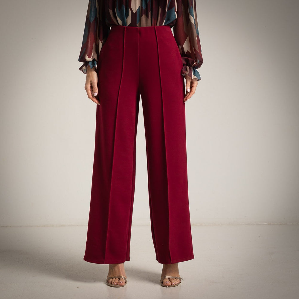 Deep Wine Red high-waisted flared trousers with a pressed centre seam - front view