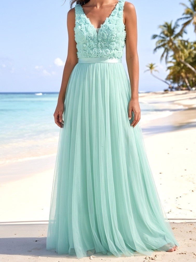 Elegant mint evening gown with flowing tulle skirt MARIΓIOÚ