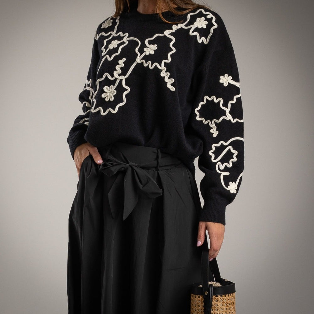 Black floral embroidered knit sweater with balloon sleeves - front view