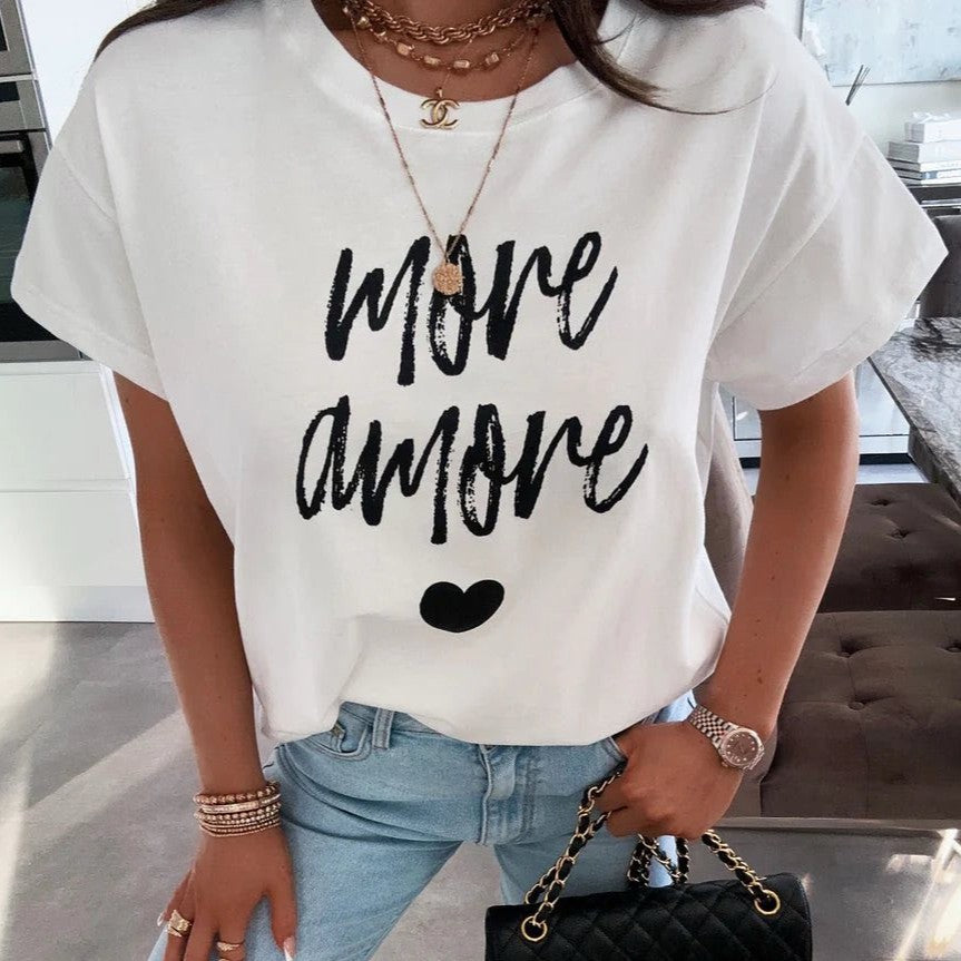 White oversized More Amore statement T shirt with black handwritten print